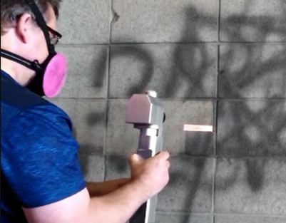 backpack laser cleaner for graffiti removal